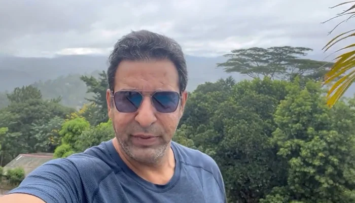 Wasim Akram giving weather updates from Kandy